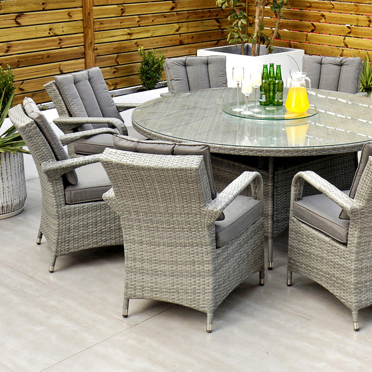 Round garden table and 2024 chairs 8 seater